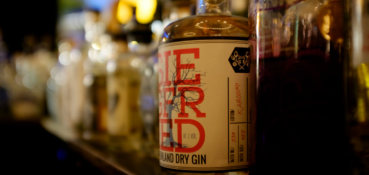 Gin-Flaschen an der Bar – große Gin-Auswahl im il Boccone am Bodensee